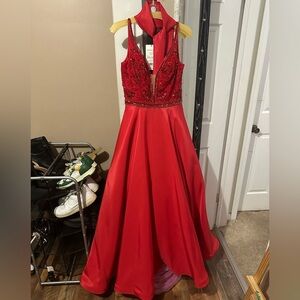 Red Sherri hill gown sleeveless, low neckline with beading